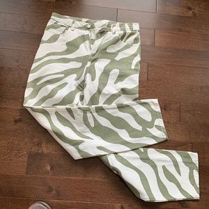 Green and white patterned jean type pants